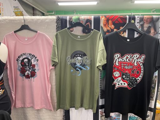 Rock n roll ladies T-shirts in pink, green and black.